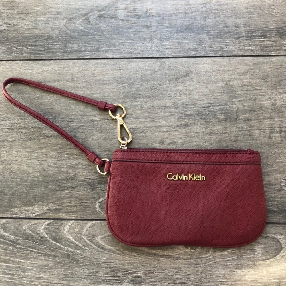 CALVIN KLEIN burgundy and gold wristlet